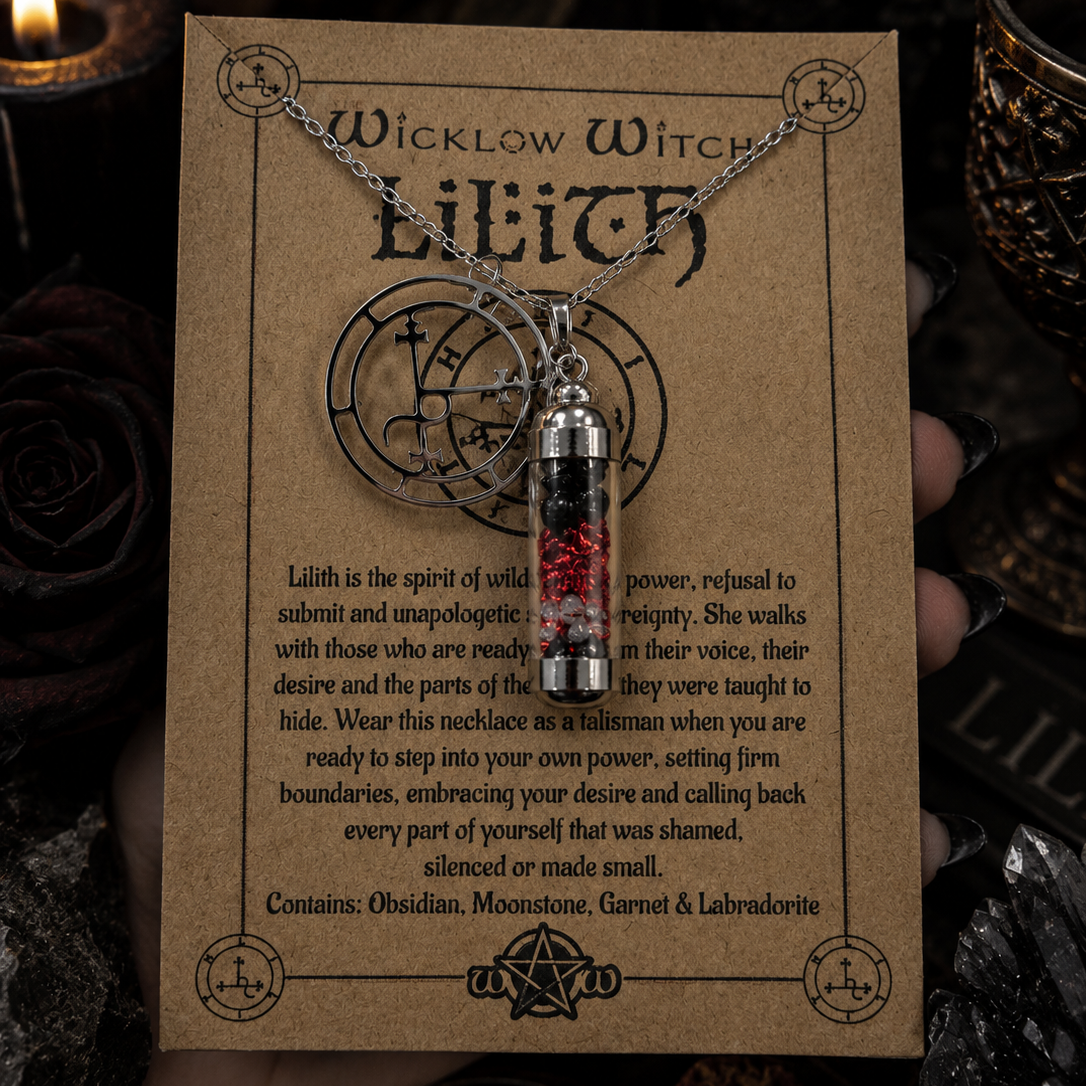 Necklace with a pendant on a 'Wicklow Witch' branded card with text and mystical symbols.