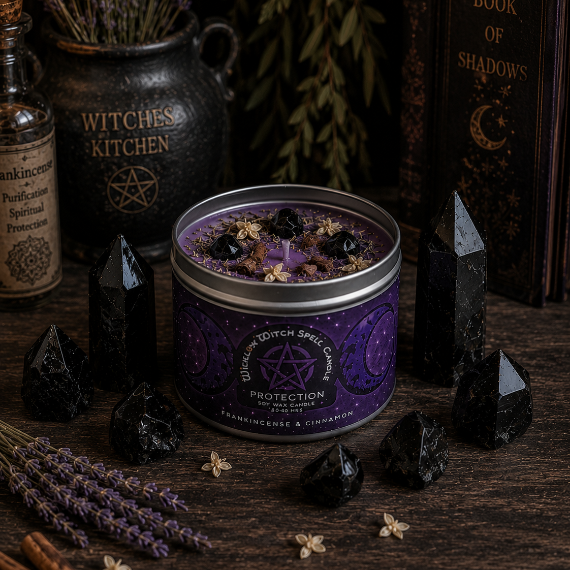 Purple candle in a tin surrounded by black crystals, lavender, and a book titled 'Book of Shadows' on a wooden surface.