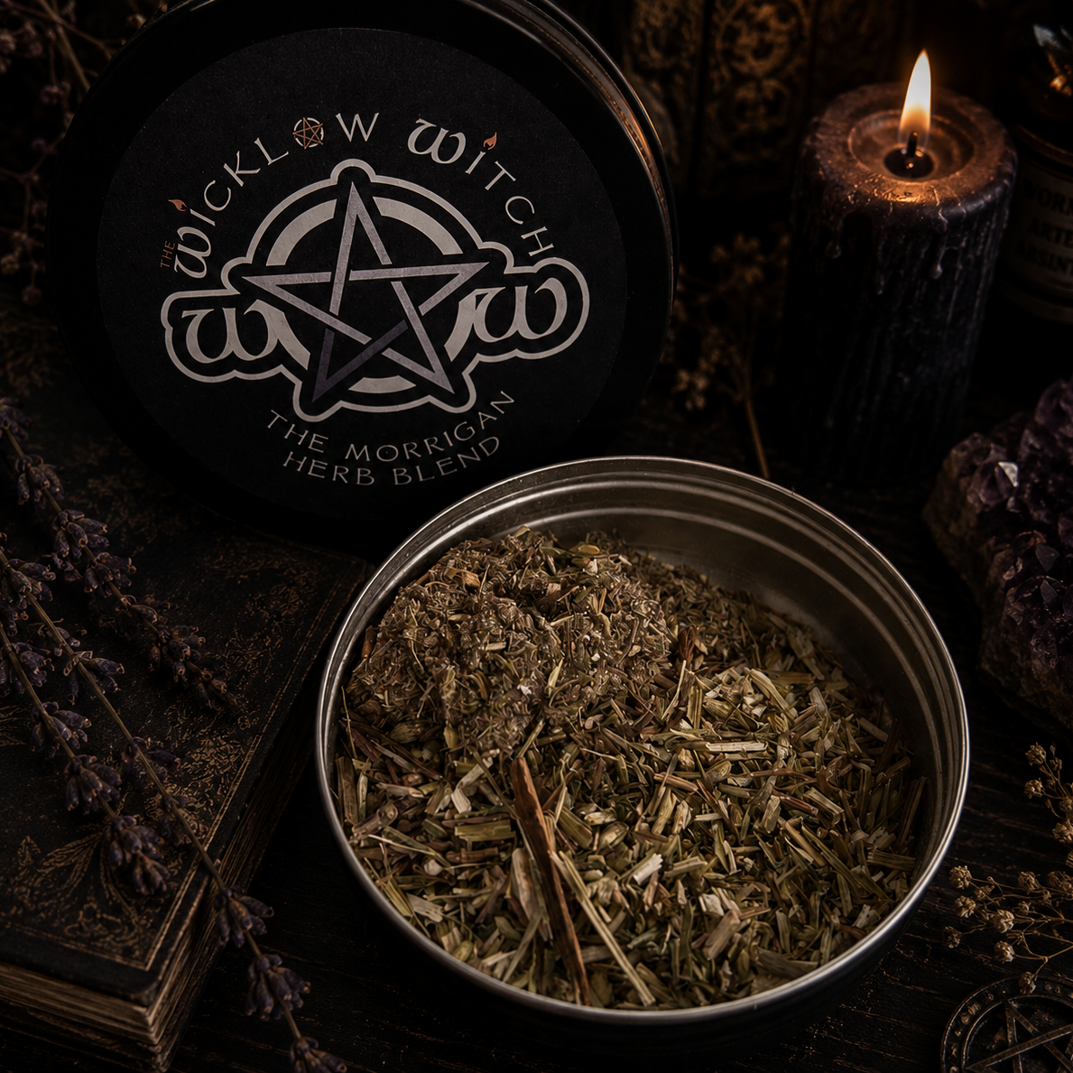 Herb blend in a tin with a candle and witchcraft-themed decor